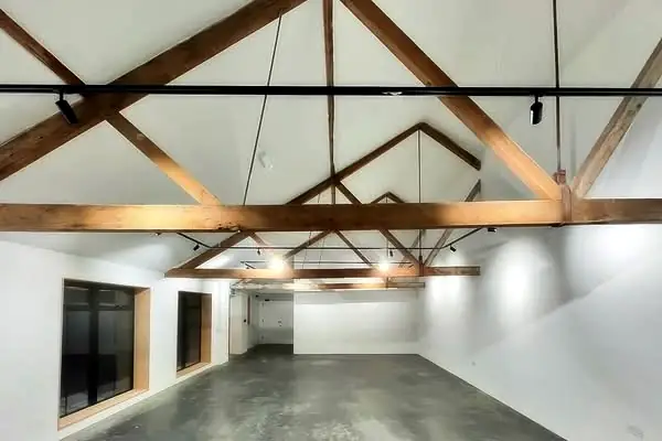 Exposed oak trusses inside