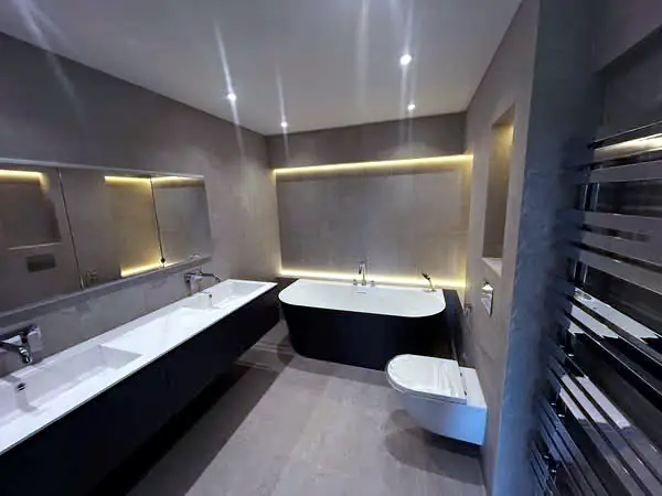 Bathroom with double basin and heated towel rail
