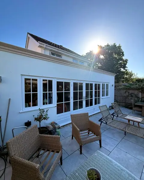 Rendered rear extension with French doors